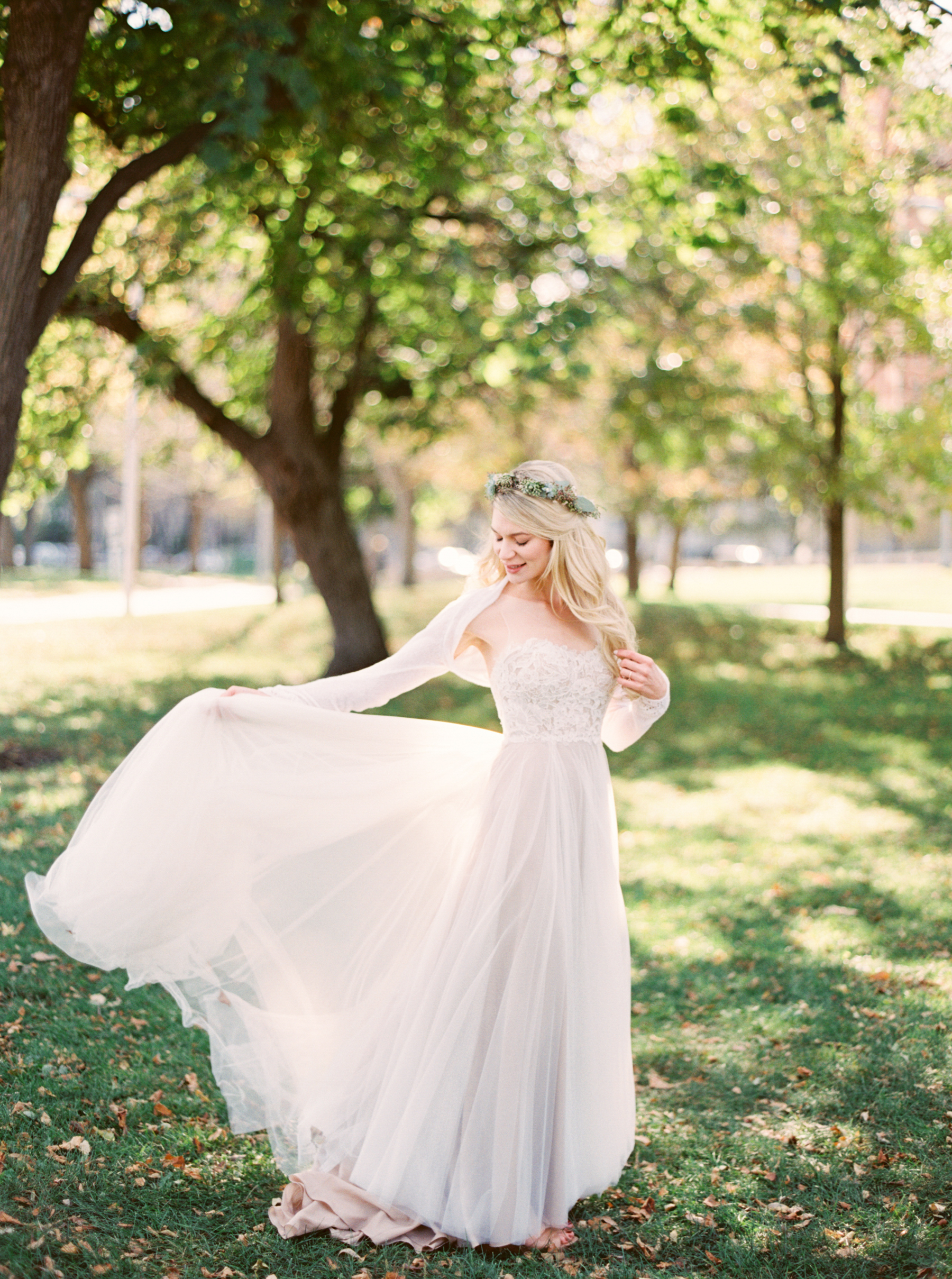beautiful bride wearing flower crown posing for Chicago Wedding Photographer