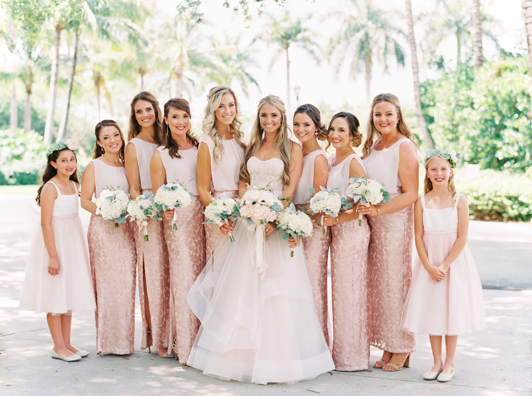 bride with bridesmaids wearing pink sequins at Naples Florida Wedding 