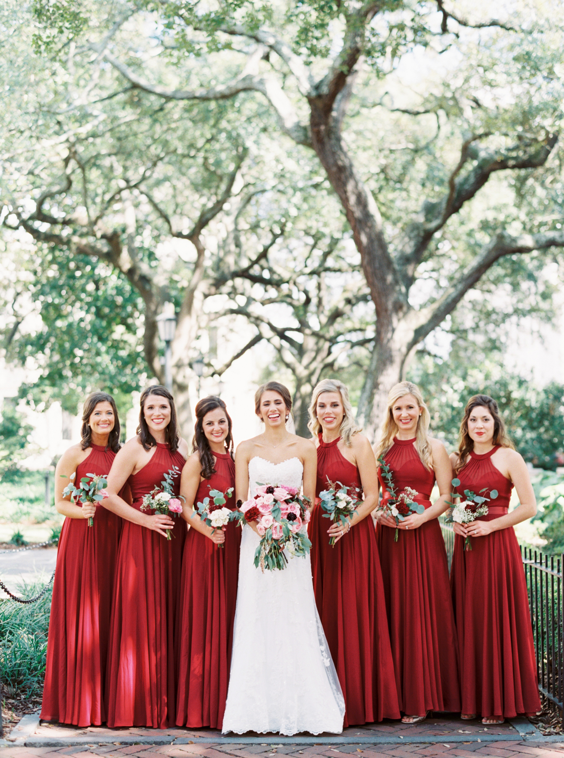 bride with bridesmaids under huge oak tree before Savannah Georgia Wedding
