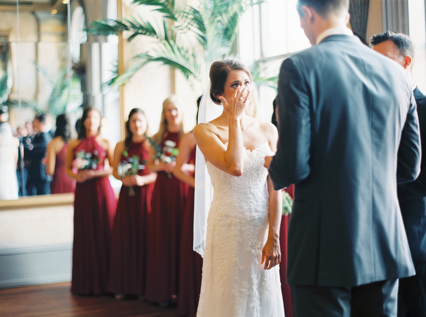 bride crying while listening to vows during Savannah Georgia Wedding photographer