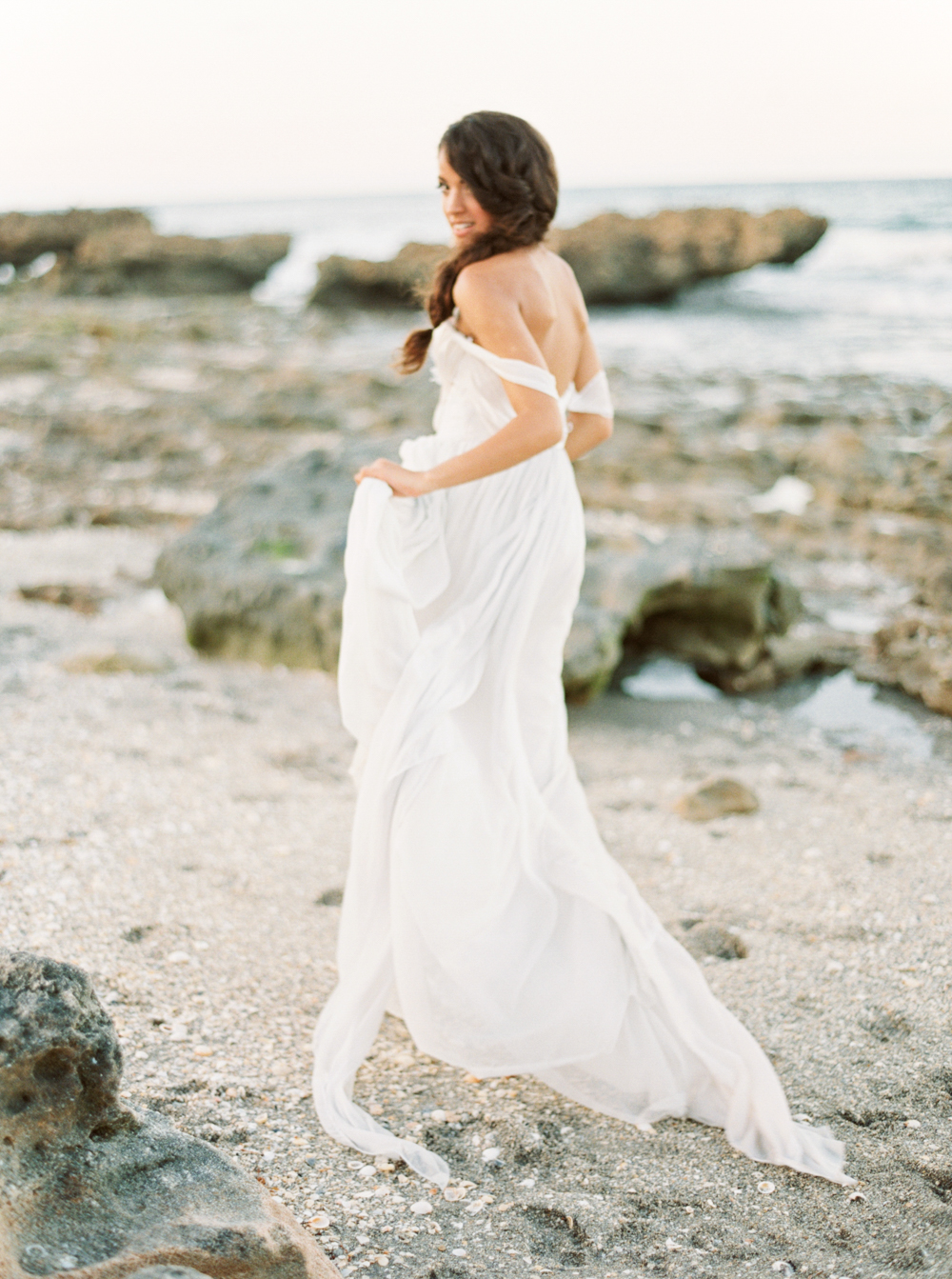bride on beach photographed during Styled Wedding Shoot with Elleson Events