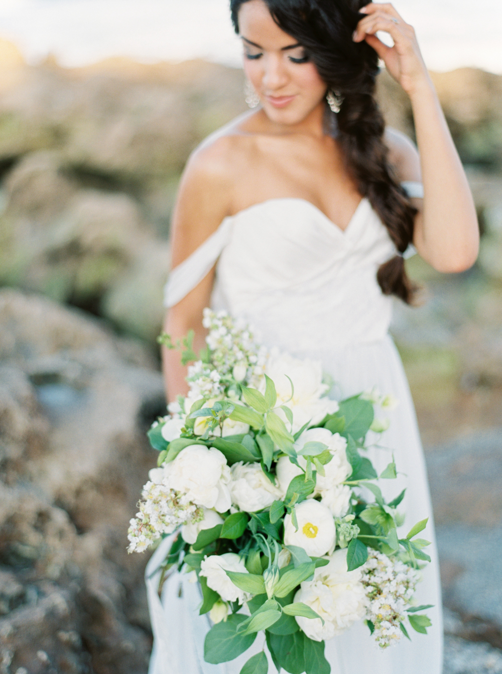 bride on beach wearing white dress with whimsical bouquet for Styled Wedding Shoot with Elleson Events