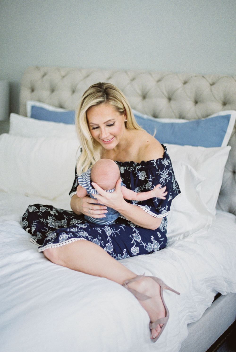 mom holding newborn son during Maternity and Newborn Sessions