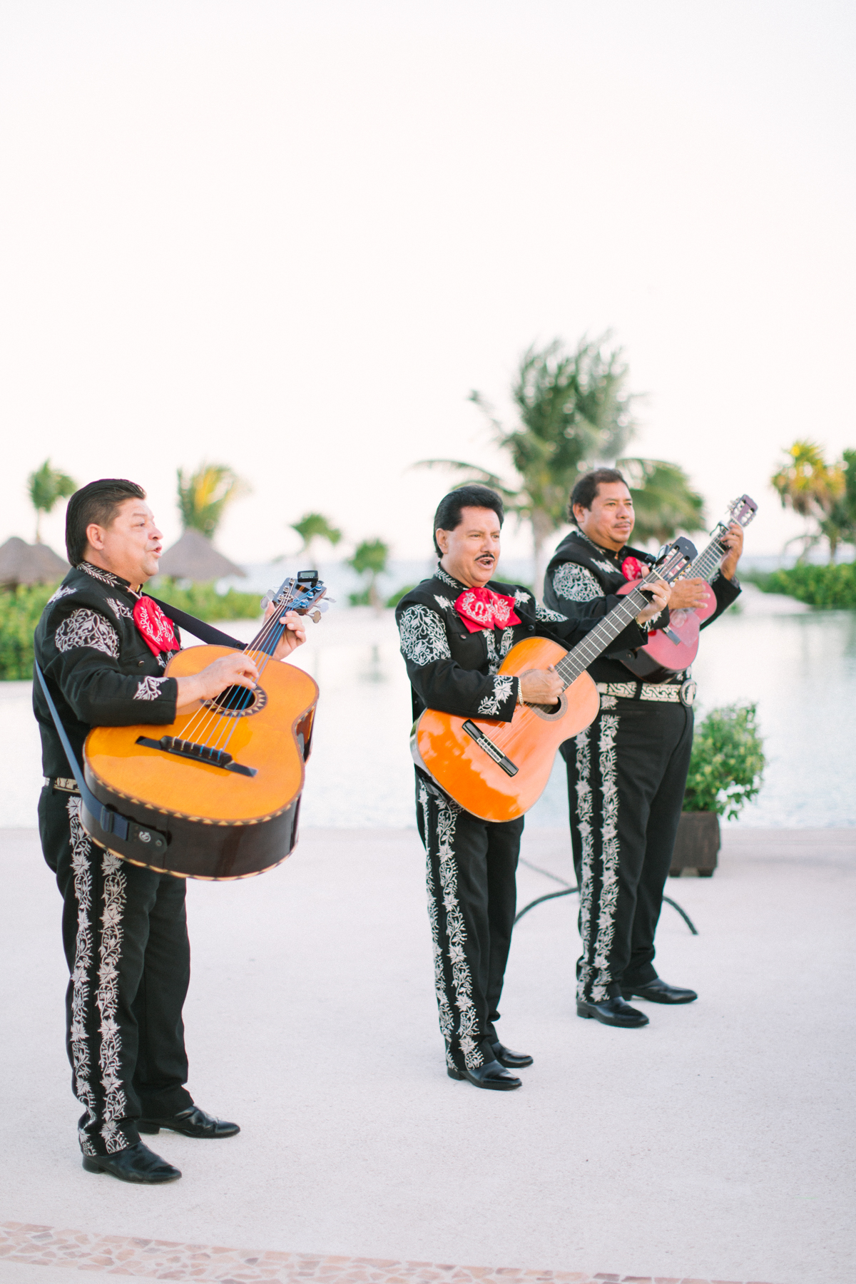Mariachi band playing at Cancun Mexico Wedding Photographer